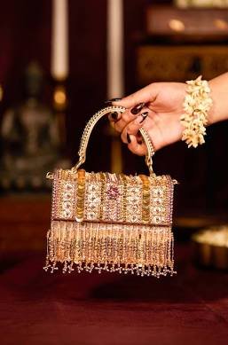 pearl bag vs clutch vs potli - Embellished Clutch: Sleek, structured, and ideal for formal evening events.